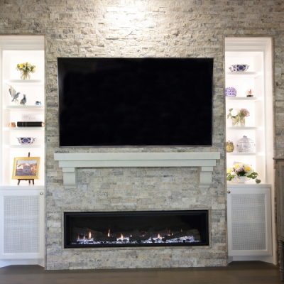 Stacked stone fireplace surround
